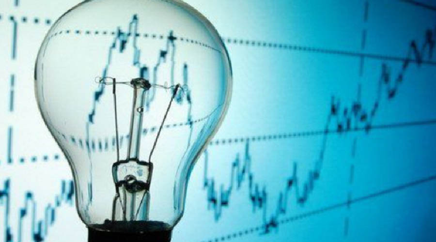 Une ampoule devant un graphique